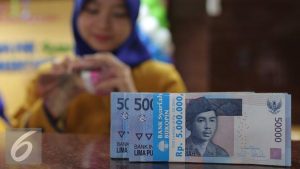 EWF | Rupiah Ditutup Menguat jadi 17.654 terhadap Dolar AS Usai BI Rate Naik