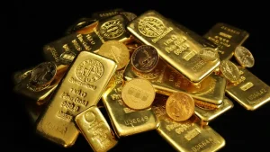 EWF | Harga Emas Dunia Merosot Dipicu Isu The Fed dan Perang Timur Tengah