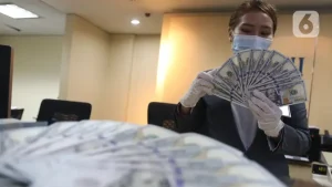 EWF | Rupiah Menguat ke 17.937 per Dolar AS, Pasar Nantikan Keputusan BI