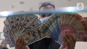 EQUITYWORLD FUTURES JAKARTA | Rupiah Hari Ini Ditutup Melemah ke 18.877 Tersengat Negosiasi AS-Iran
