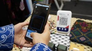 EQUITYWORLD FUTURES JAKARTA | Mau Pakai QRIS untuk Jualan? Cek Cara Ini biar Tak Kena Potongan Biaya